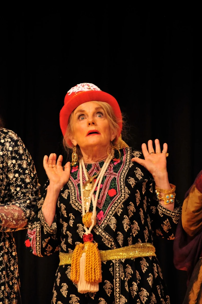Variety Plus archive: a performer in an ornate costume and red headpiece