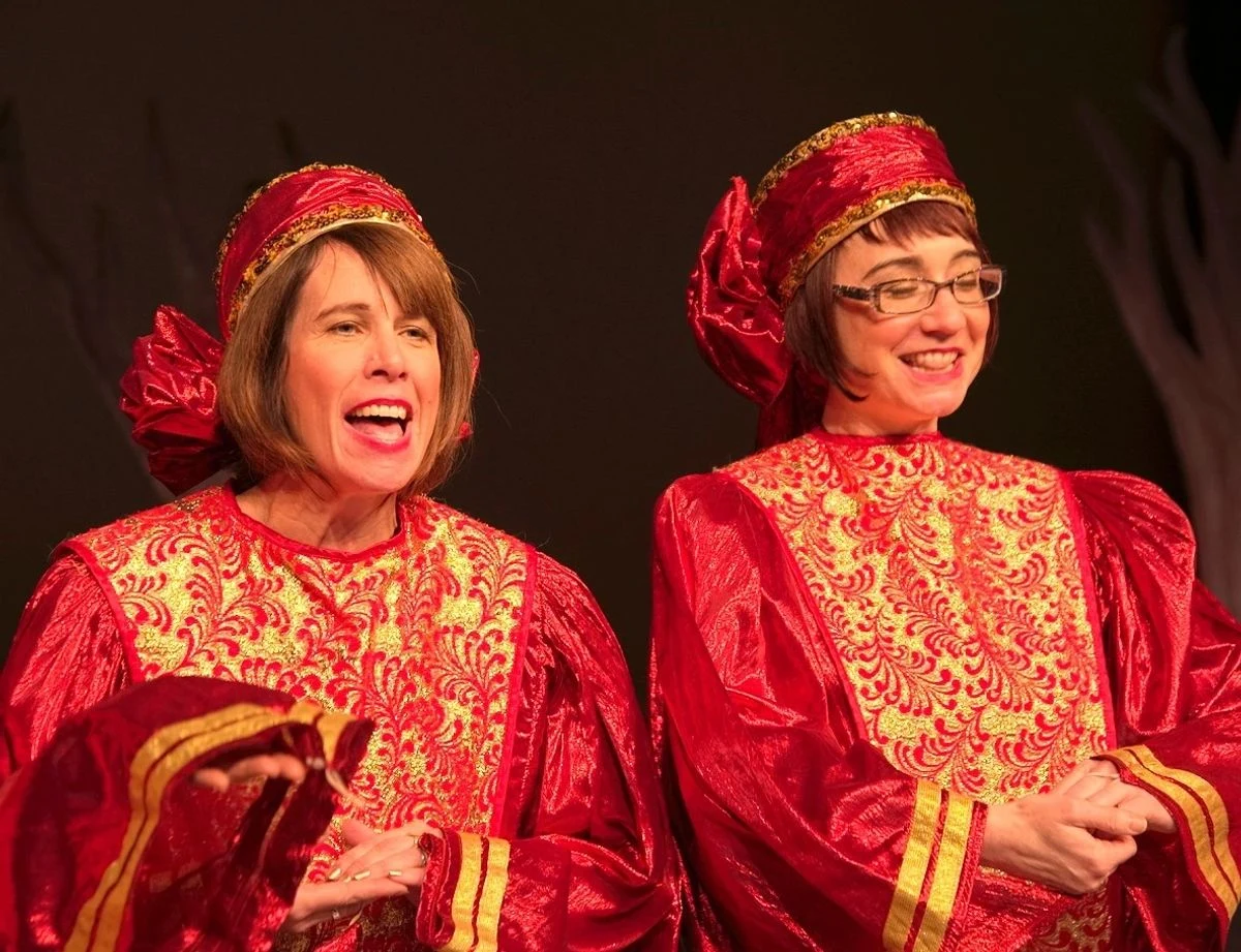 Frog Prince archival stage photograph: two performers in red and gold costumes